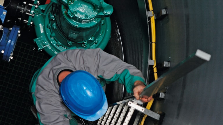 Man in Wilo-EMUport solids separation system, Usedom, Germany
