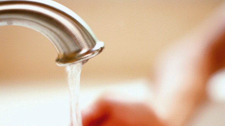 Hands under tap