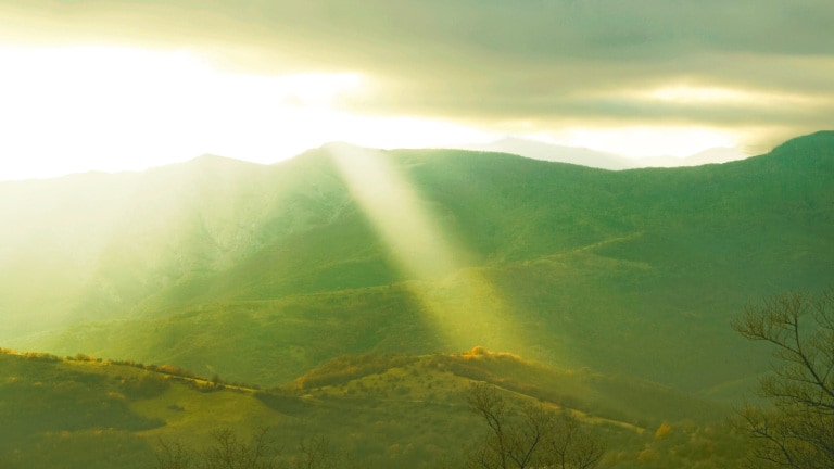 Sun over mountains