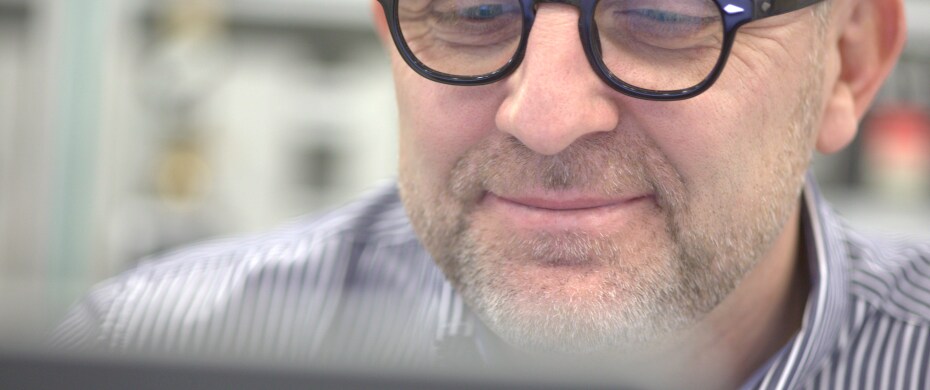Footage, man with glasses