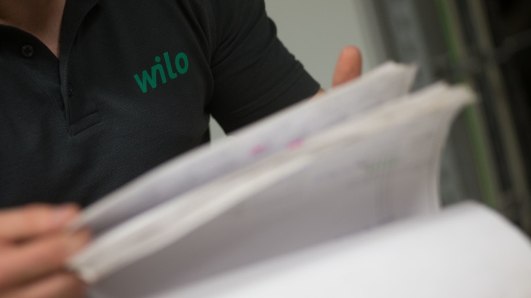 Employee reads documents ,footage