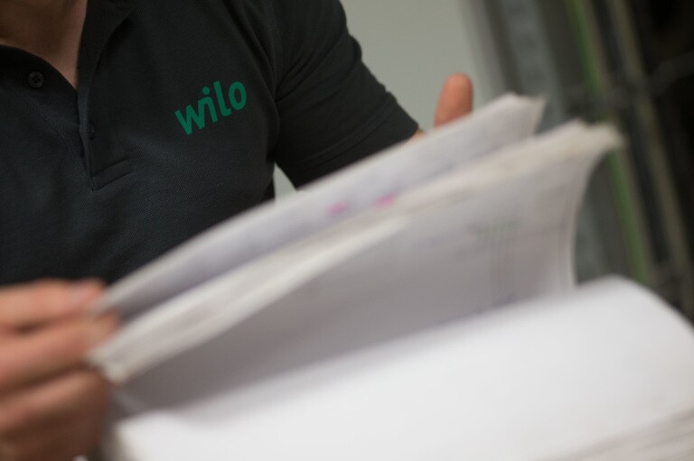 Employee reads documents ,footage